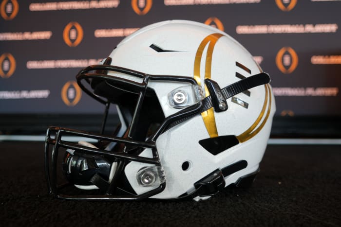 A detailed view of a helmet with the College Football Playoff logo at CFP press conference at Banc of California Stadium.